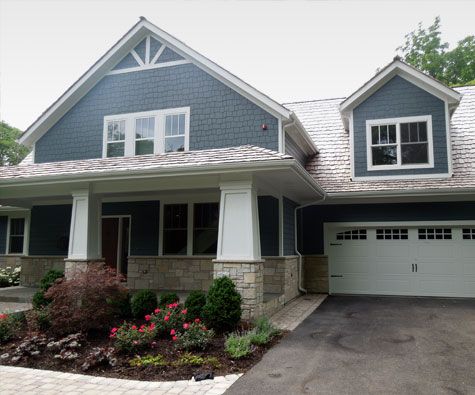 Vinyl siding house with the new exterior after siding installation in Naperville