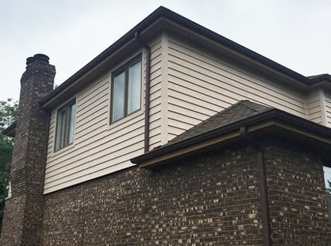 Complete exterior remodeling project photo after siding and roofing services in Downers Grove