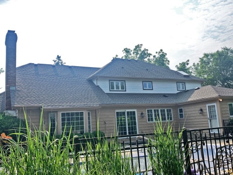 Cedar siding installation and GAF shingle roofing in Downers Grove project photo 4