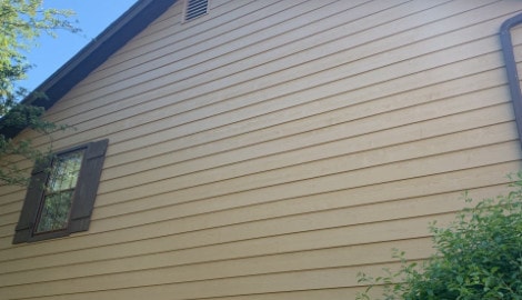 Cedar siding installation and windows replacement in Oak Brook project photo 3