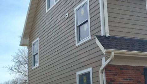 LP Diamond Kote siding installation and gutters replacement in Naperville project photo 12