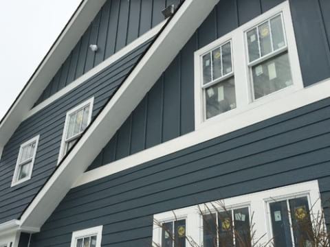 LP SmartSide wood siding Installation and gutters replacement in Glen Ellyn project photo 1