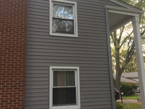 LP SmartSide wood siding Installation and gutters replacement in Downers Grove project photo 4