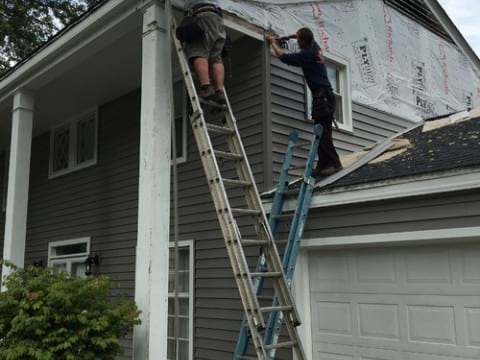 LP SmartSide wood siding Installation and gutters replacement in Downers Grove project photo 6