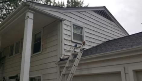 LP SmartSide wood siding Installation and gutters replacement in Downers Grove project photo 7