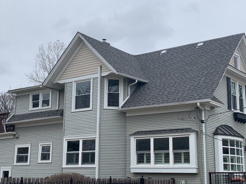Royal Estate siding installation and shingle roof replacement in Arlington Heights project photo