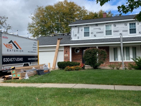 Royal Estate siding installation and  shingle roof replacement in Woodridge before after project photo 4