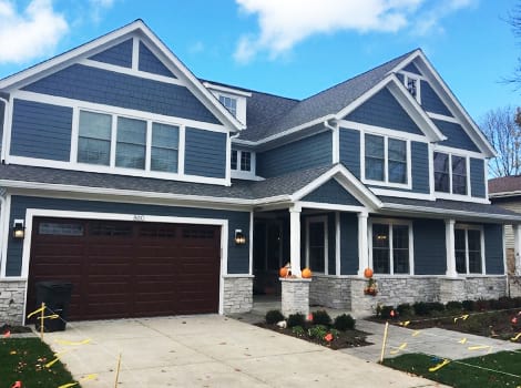Jame Hardie siding and windows trim replacement project in Northbrook