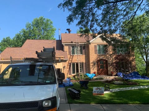 Shingle roofing replacement after hail damage in Naperville project photo 1