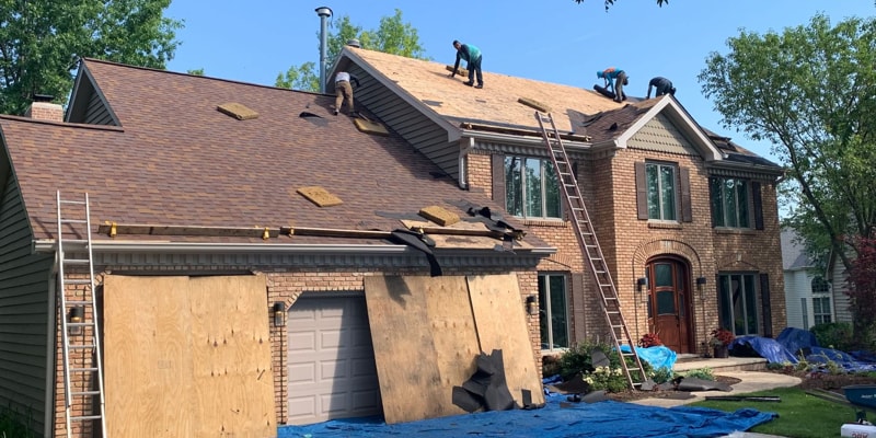 Shingle roof replacement after hail damage in Naperville, IL