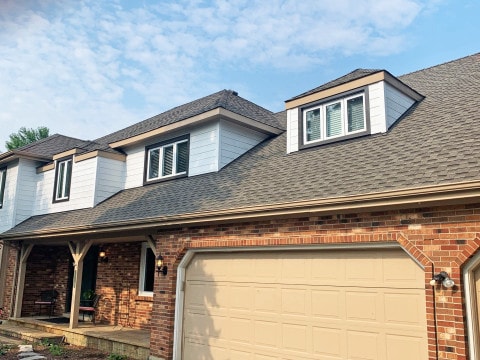 Cedar siding installation and GAF shingle roofing in Downers Grove project photo