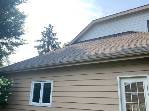 Cedar siding installation and GAF shingle roofing in Downers Grove project photo 2