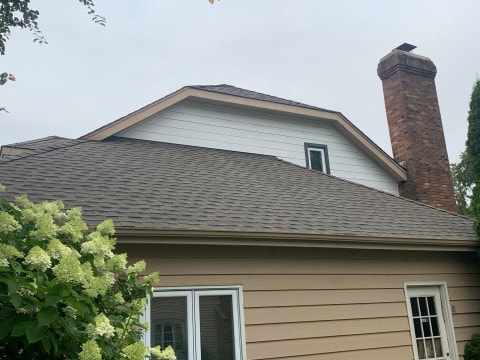 Cedar siding installation and GAF shingle roofing in Downers Grove project photo 5