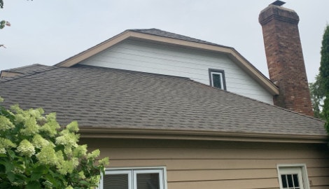 Cedar siding installation and GAF shingle roofing in Downers Grove project photo 5