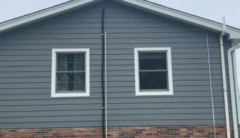 LP SmartSide siding, Atlas Pinnacle shingle roofing and guttering in Hinsdale project photo 6