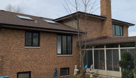 LP SmartSide siding, GAF shingle roofing, guttering and windows replacement in Lemont project photo 7