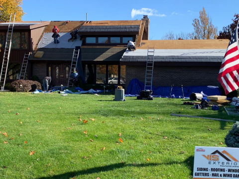 GAF shingle roof installation and guttering in Darien project photo  4