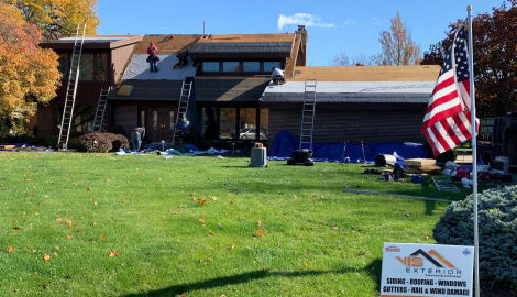 GAF shingle roof installation and guttering in Darien project photo  4
