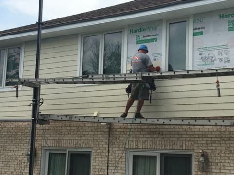 James Hardie siding installation and shingle roof replacement in Orland Park project photo 6