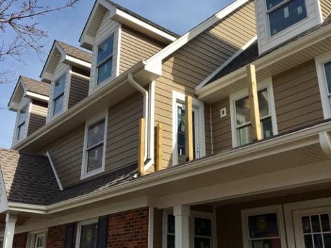 LP Diamond Kote siding installation and gutters replacement in Naperville project photo 1