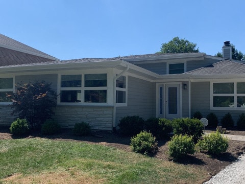 LP SmartSide siding installation and shingle roof replacement in Hinsdale project photo
