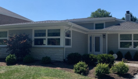 LP SmartSide siding installation and shingle roof replacement in Hinsdale project photo 1