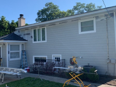 LP SmartSide siding installation and shingle roof replacement in Hinsdale project photo 11