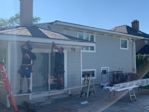 LP SmartSide siding installation and shingle roof replacement in Hinsdale project photo 12