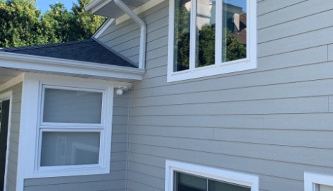 LP SmartSide siding installation and shingle roof replacement in Hinsdale project photo 2