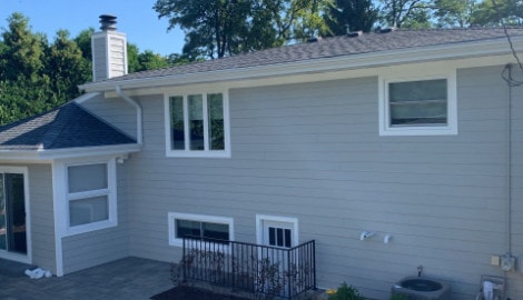 LP SmartSide siding installation and shingle roof replacement in Hinsdale project photo 4