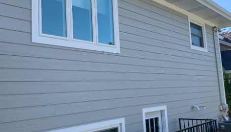 LP SmartSide siding installation and shingle roof replacement in Hinsdale project photo 6