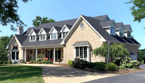 LP SmartSide ExpertFinish siding installation and guttering in St. Charles project photo 2