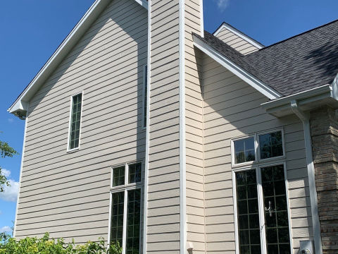 LP SmartSide ExpertFinish siding installation and guttering in St. Charles project photo 4