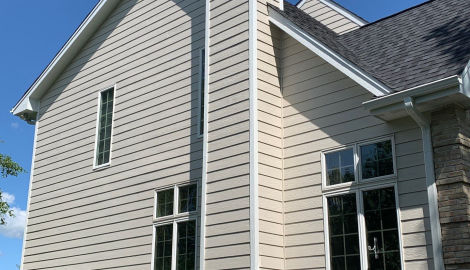 LP SmartSide ExpertFinish siding installation and guttering in St. Charles project photo 4