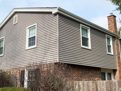 Royal Estate vinyl siding installation, windows and gutters installation in Naperville project photo 1