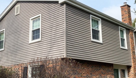 Royal Estate vinyl siding installation, windows and gutters installation in Naperville project photo 1