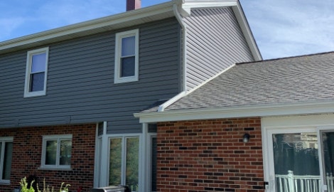 Royal Estate siding installation and  shingle roof replacement in Woodridge before after project photo 2