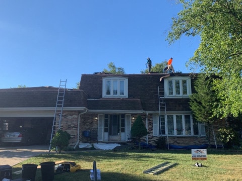Shingle roof replacement after hail damage in Darien project photo 2