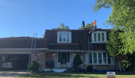 Shingle roof replacement after hail damage in Darien project photo 2
