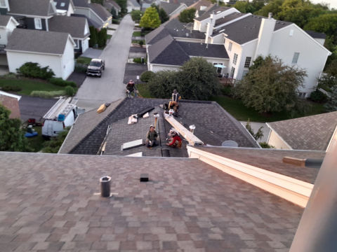 Roof inspection and shingle roofing after hail damage in Geneva project photo 1