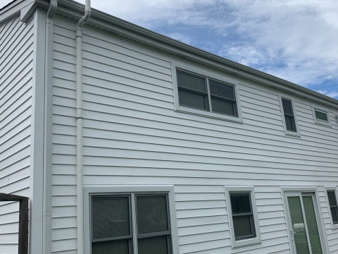 Vinyl siding installation & gutters replacement after hail damage in Downers Grove project photo 5