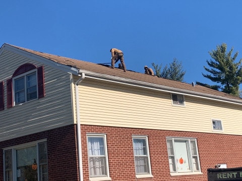 Complete vinyl siding and GAF shingle roof replacement after hail damage in Lombard project photo 6