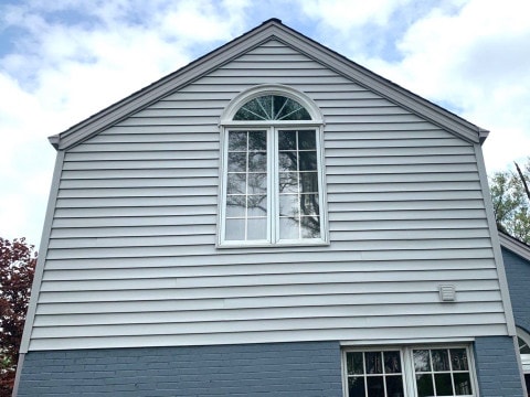 Vinyl siding installation and shingle roof replacement after hail damage in Clarendon Hills project photo 5