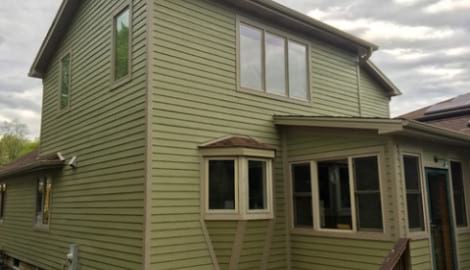 LP SmartSide siding and gutters replacement in Downers Grove project photo 1