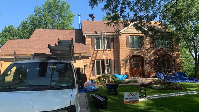 Shingle roofing after hail & wind damage in Naperville, IL